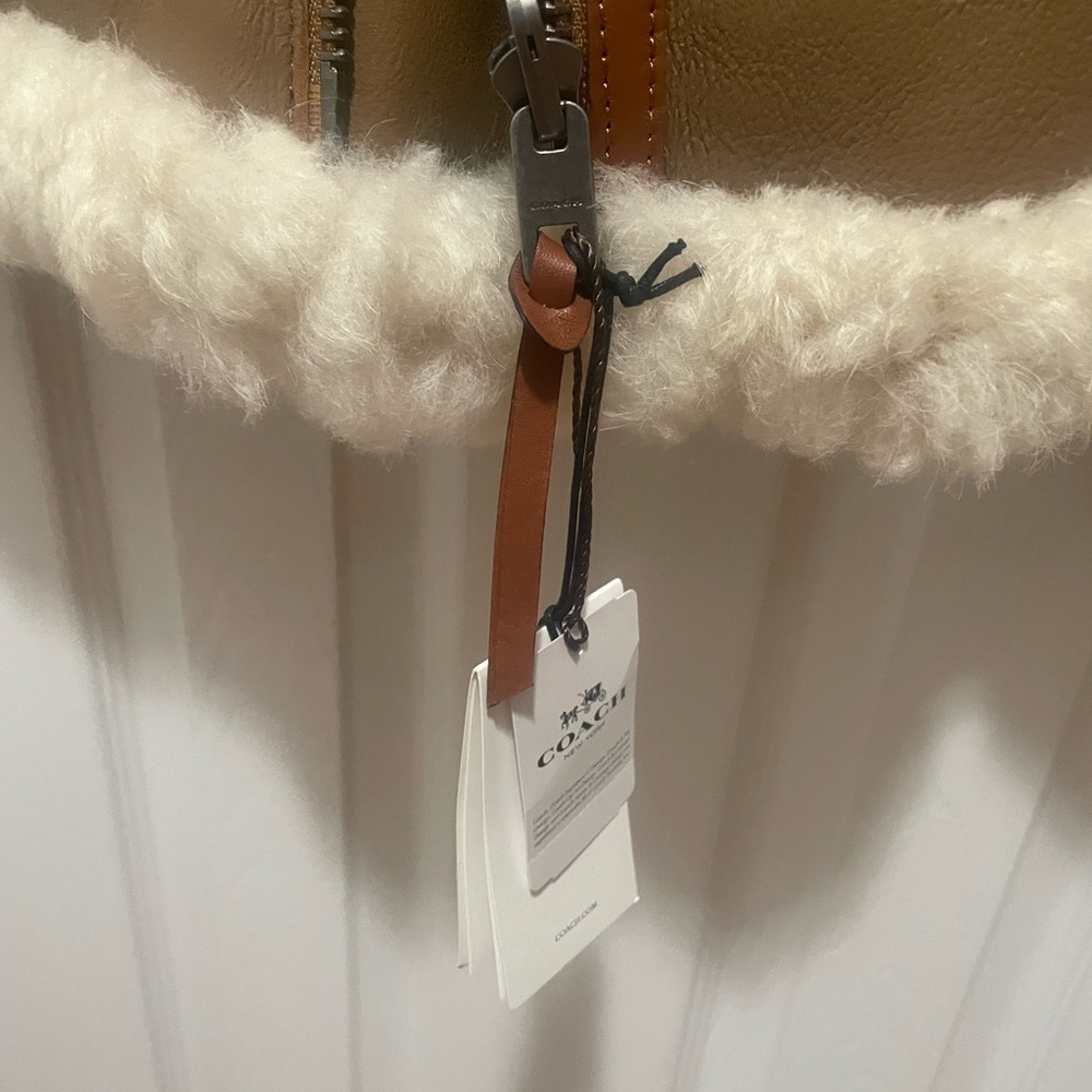Coach  Lamb leather/shearling natural/ivory reversible Vest. - Picture 9 of 16